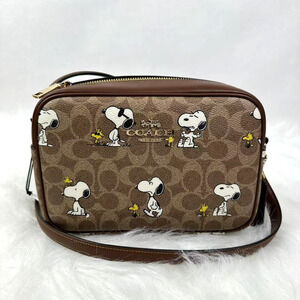 Coach X Peanuts Jamie Camera Bag In Signature Canvas With Snoopy Print CBM27